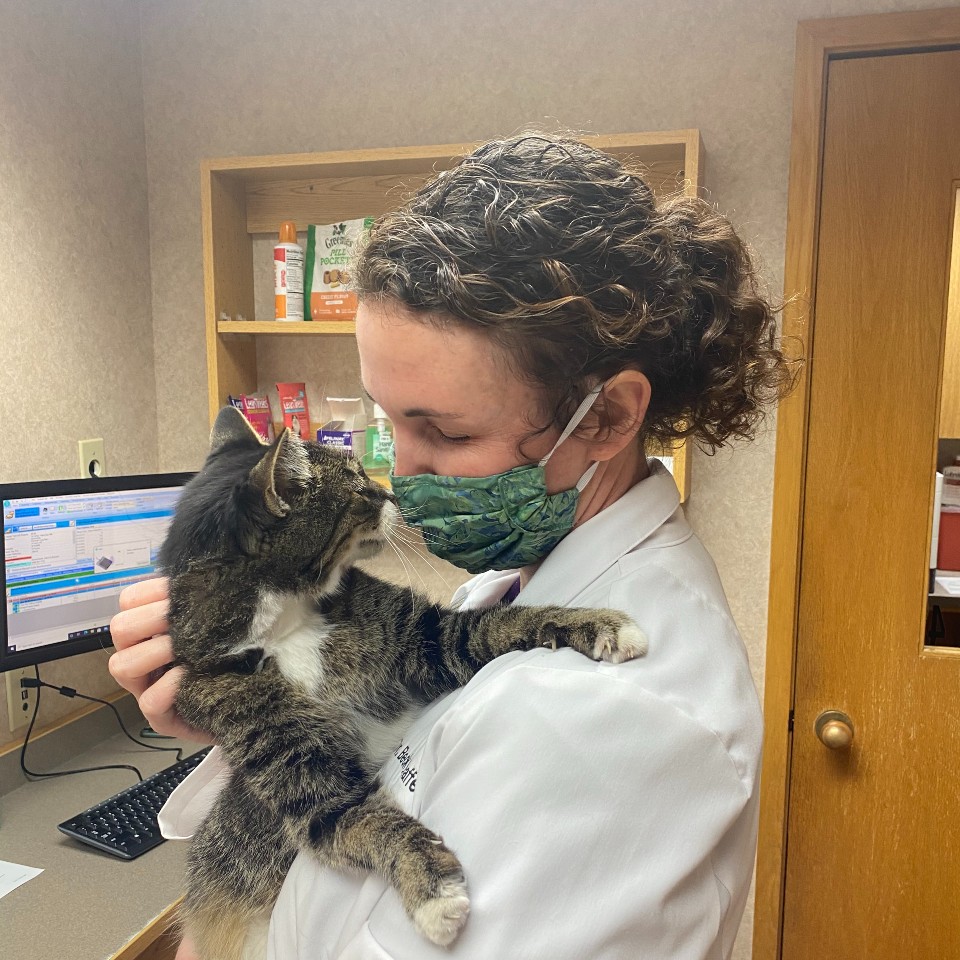 Dr. Schaffter and her patient, senior cat Piglet 