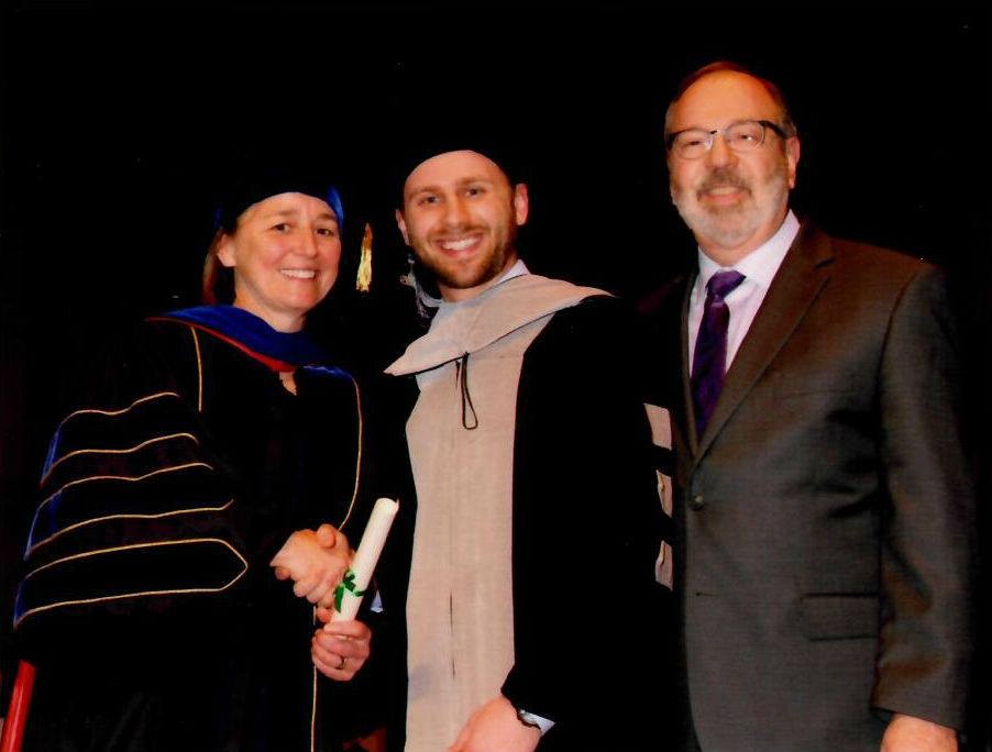 Dr. Clayton Siegle and Dr. Rick Siegle of Cascade Hospital for Animals on the day of Dr. Clayton Siegle graduation from veterinary school.