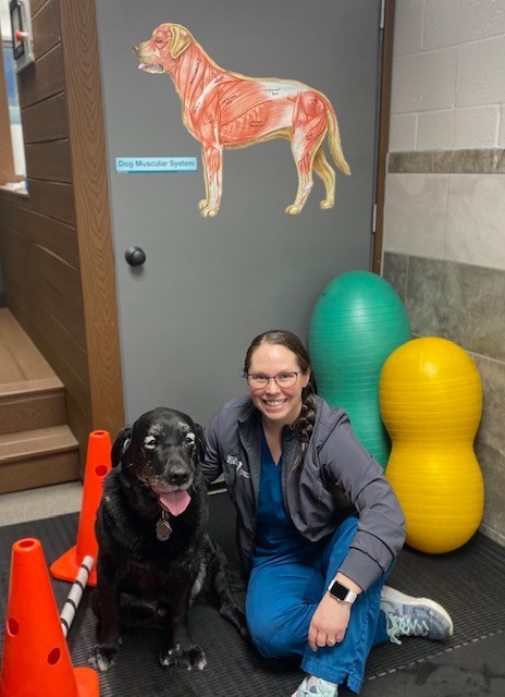 Veterinary rehabilitation nurse Emily Harkness with loyal client, Colby, age 10.