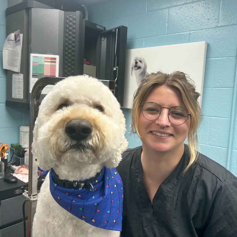 Brittney poses with a grooming client