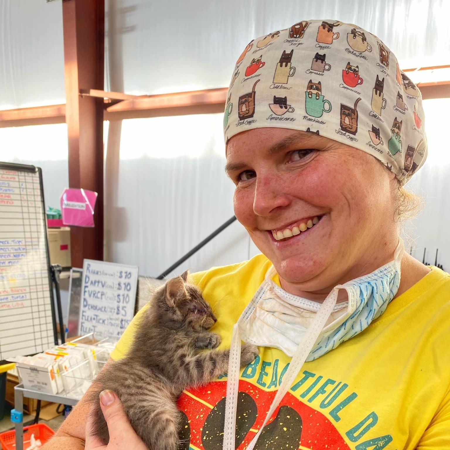 Dr. Solnik cuddles a kitten during her volunteer trip.